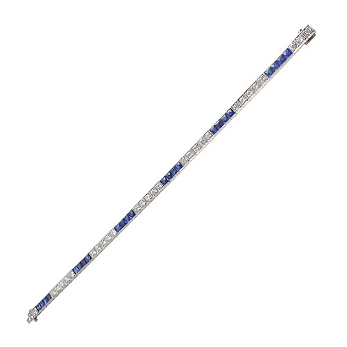 Art Deco sapphire and diamond line bracelet, alternating groups of four French cut sapphires with five round brilliant cut diamonds,